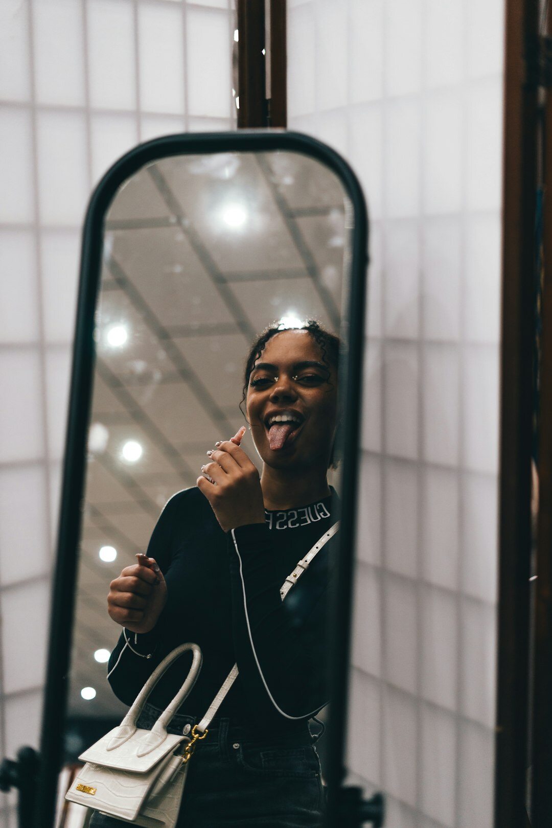 woman practicing speech in mirror