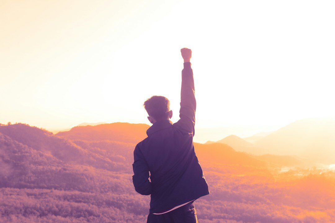 person achieving goals success