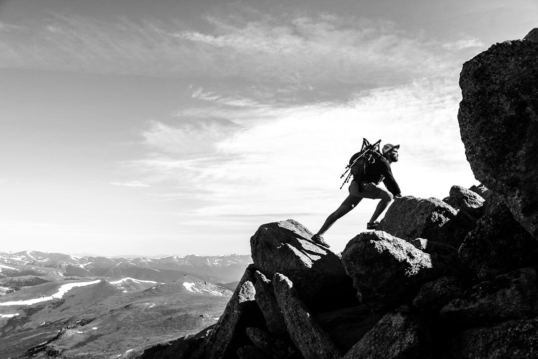 person exploring new horizons in mountains